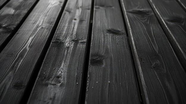 Dark stained wooden planks arranged in parallel lines photo