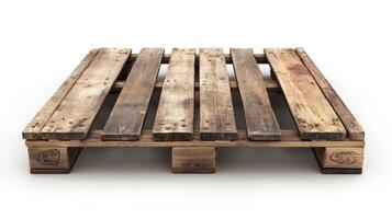 A weathered wooden pallet sits on a white background photo