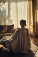 Enjoying morning light while wrapped in a cozy microfiber towel photo
