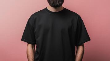 Man wearing a black t-shirt with a minimalist background photo