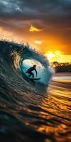Surfer rides a wave at sunset on a tranquil beach photo
