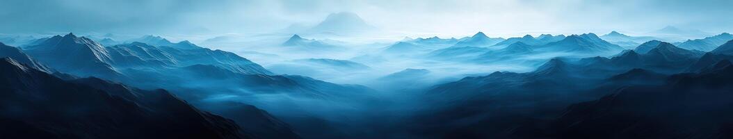 Fog blankets mountains creating a serene and mystical landscape photo