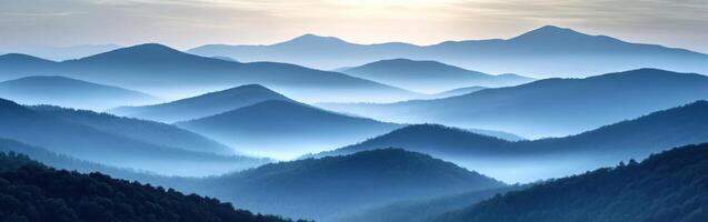 Mysterious fog blankets rolling hills at dawn in nature's embrace photo