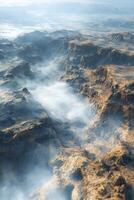 Misty landscape revealing rugged terrain under soft fog in nature photo