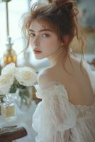 Soft natural light illuminates a young woman's delicate features photo