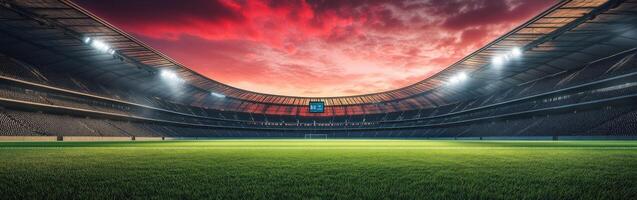 Stadium under dramatic sunset with vibrant sky and lights photo