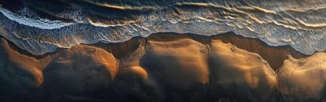 An aerial view of the ocean and waves photo