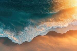 Vibrant shoreline at sunset with gentle waves lapping photo