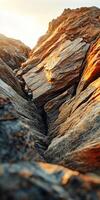 Stunning rocky cliff at sunset photo