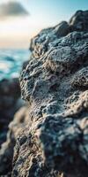 Unique cliffside textures by the ocean photo