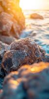 Rocks along a sunlit cliff edge photo