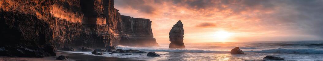 Sunset over the rugged cliff coastline photo