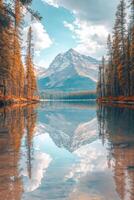 A lake surrounded by trees and mountains photo