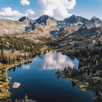 Majestic mountain lake reflects sky photo