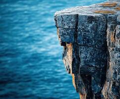 Stunning cliff edge overlooking ocean photo