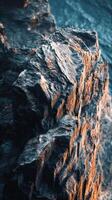 Rocky coastline at sunset photo