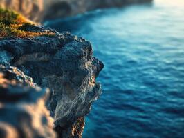 Ocean view from rocky cliff photo