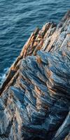 A rock formation on the coast of new england photo
