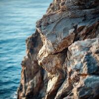 Rocky coastline beside the sea photo