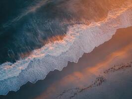 Waves caressing sandy shore photo