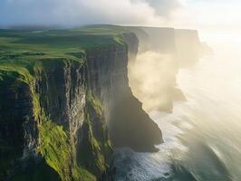 Rocky cliffs meet ocean mist photo
