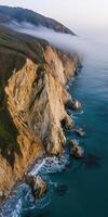 Rocky coast at sunrise photo