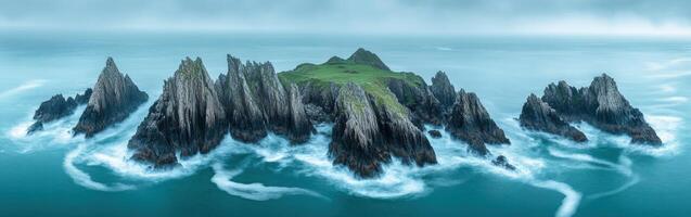 Rocky coast with rugged island photo
