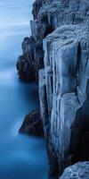 Rocky coastline at twilight photo