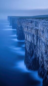 Oceanwaves near steep cliffs photo