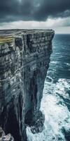 Stunning coastal cliff at dawn photo