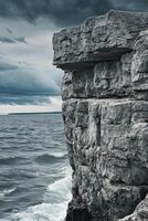 Rugged cliff edge by the sea photo