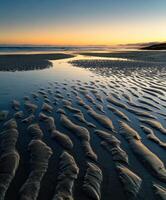 Sunset over rippling sands photo