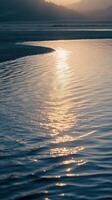 Calm water reflects sunset glow photo