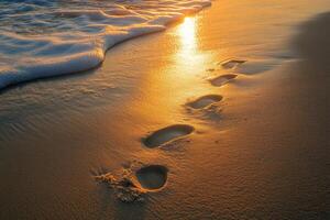 Footprints in the golden sand photo