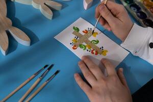 Painting Easter cross Gift Easter idea. Do it yourself instruction postcard eco-friendly decoration. Making handmade art presents children's diy projects. Spring holiday family time. Creative activity photo