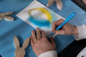 EASTER egg made of rope and feathers Sustainable preparation Diy process of making handmade greeting cards. Step by step activity for children. Inclusive and responsible stress relief holiday hobby. Conscious celebration photo