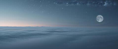A full moon is seen above the clouds photo
