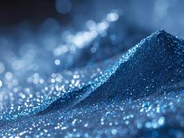 Abstract Blue Glitter Texture Crushed Eyeshadow on Black Background photo