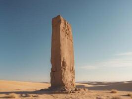 A large stone monument in the middle of the desert photo