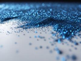 Abstract Blue Glitter Texture Crushed Eyeshadow on Black Background. photo