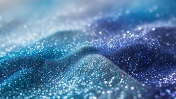 Blue glittering waves of water on a blue background photo