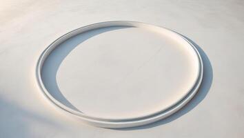 A white circular ring on a white surface photo