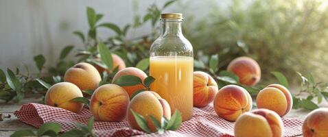 Peaches and juice on a table photo