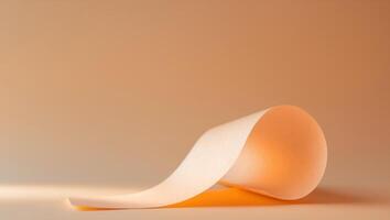 Orange backdrop with curved paper creating soft light photo