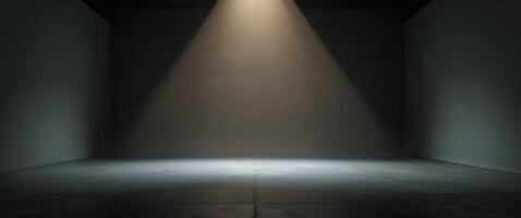 Soft beam of light illuminating an empty stage in a dimly lit room. photo