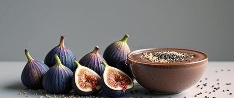 Figs and chocolate smoothie on a gray background photo