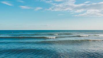 A view of the ocean with waves and clouds photo
