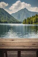 Lake View From Rustic Wooden Table with Mountain and Forest Backdrop photo