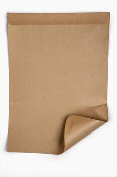 Craft Paper Sheet Curling Corner Against White Background for Mockups photo