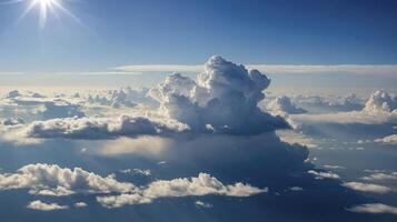 Aerial View of Cumulus Clouds and Sun Shining Through the Atmosphere photo